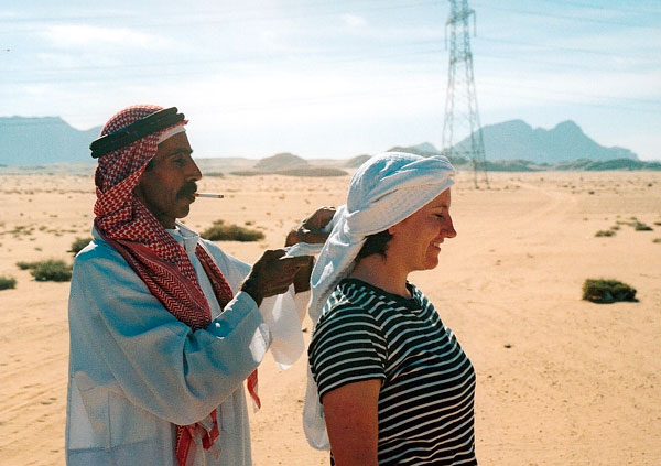 Hassan tying A's scarf
